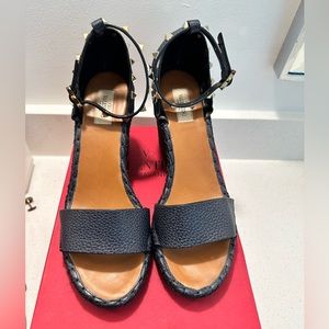 Valentino Garavani
Rockstud Ankle-Wrap Wedge Sandal, Dark Blue Denim